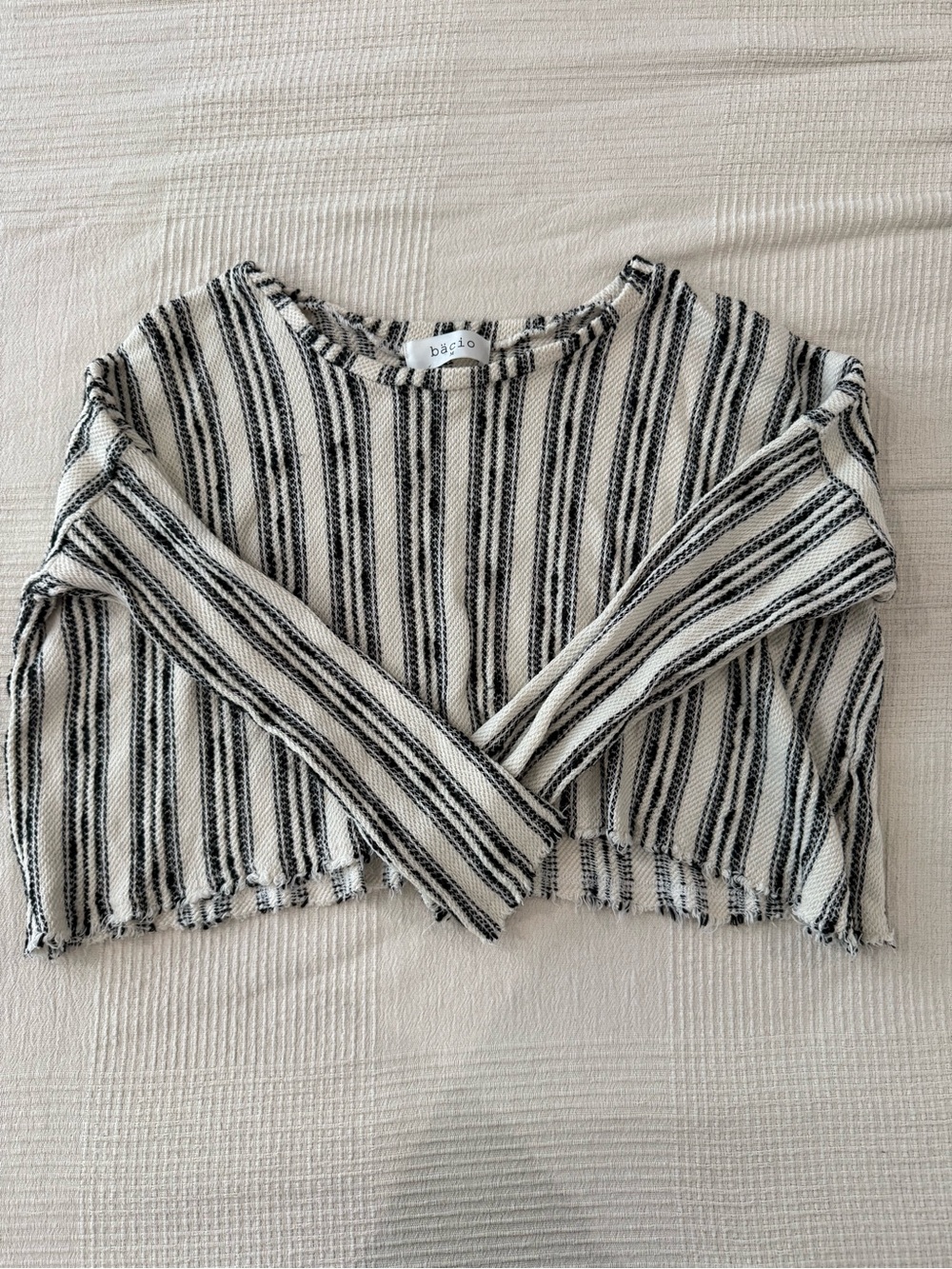 Bacio Striped Knit Sweater (cropped fit)
Boutique designer from NYC